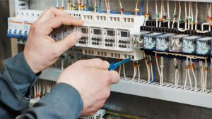 Testing fuse board with Landlord Electrical Safety Certificate